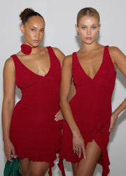 This is an image of Anyssa Mini in Ruby - RESA featuring a model wearing the dress