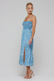 This is an image of Ashley Midi in Iris - RESA featuring a model wearing the dress