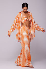 This is an image of Bowie Top in Solstice - RESA featuring a model wearing the dress