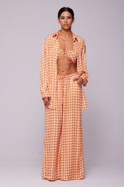 This is an image of Bowie Top in Solstice - RESA featuring a model wearing the dress