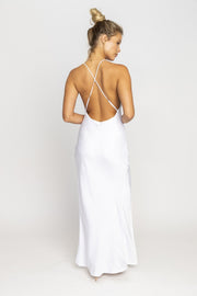 This is an image of Camille Slip Dress - RESA featuring a model wearing the dress