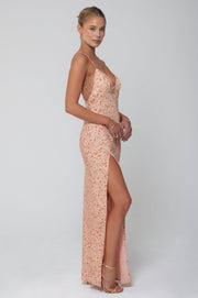 This is an image of Camille Slip in Sunstone - RESA featuring a model wearing the dress