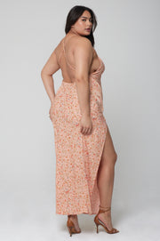 This is an image of Camille Slip in Sunstone - RESA featuring a model wearing the dress