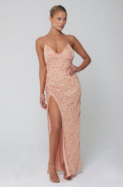 This is an image of Camille Slip in Sunstone - RESA featuring a model wearing the dress