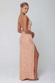 This is an image of Camille Slip in Sunstone - RESA featuring a model wearing the dress