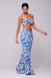 This is an image of Chase Pant in Pacific - RESA featuring a model wearing the dress