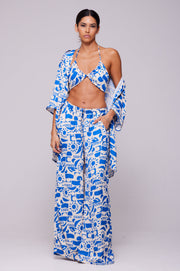 This is an image of Chase Pant in Pacific - RESA featuring a model wearing the dress