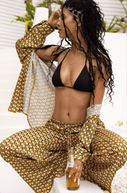 This is an image of Chase Pant in Zuma - RESA featuring a model wearing the dress