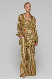 This is an image of Chase Pant in Zuma - RESA featuring a model wearing the dress