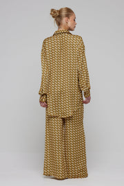 This is an image of Chase Pant in Zuma - RESA featuring a model wearing the dress