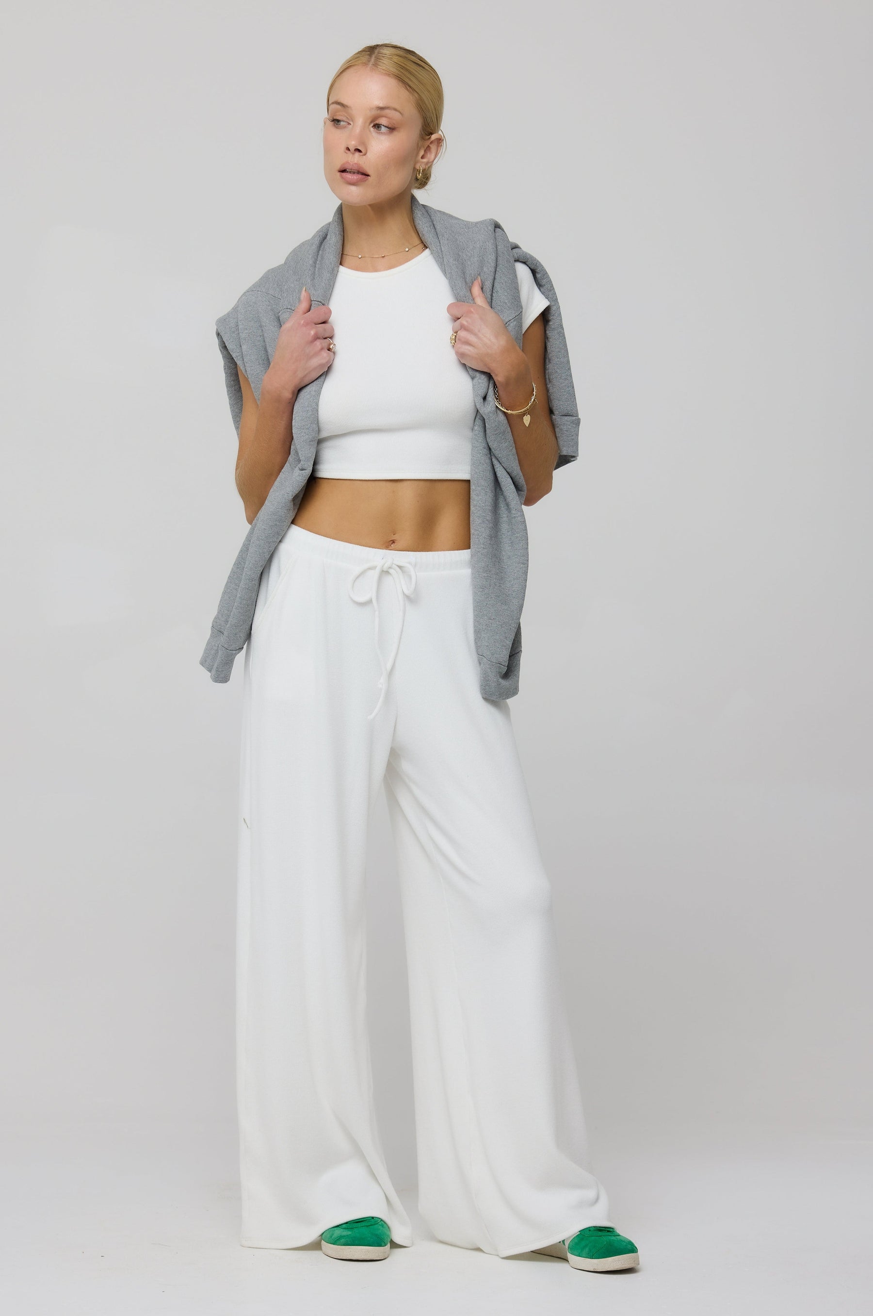 This is an image of Chase Rib Pant in White - RESA featuring a model wearing the dress