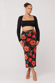 This is an image of Clyde Mesh Skirt in Poppy - RESA featuring a model wearing the dress