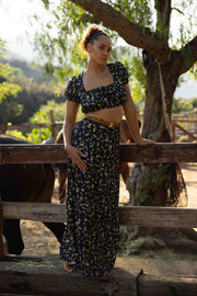This is an image of Daisy Top in Midnight - RESA featuring a model wearing the dress