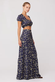 This is an image of Daisy Top in Midnight - RESA featuring a model wearing the dress