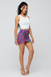 This is an image of Dash Skirt in Candy - RESA featuring a model wearing the dress
