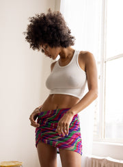 This is an image of Dash Skirt in Candy - RESA featuring a model wearing the dress