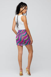 This is an image of Dash Skirt in Candy - RESA featuring a model wearing the dress