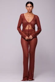 This is an image of Elise Top in Brick - RESA featuring a model wearing the dress