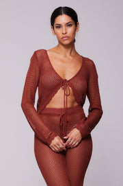 This is an image of Elise Top in Brick - RESA featuring a model wearing the dress