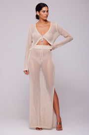 This is an image of Elise Top in Natural - RESA featuring a model wearing the dress