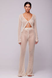 This is an image of Elise Top in Natural - RESA featuring a model wearing the dress