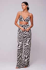 This is an image of Emma Top in Tigris - RESA featuring a model wearing the dress