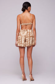This is an image of Emma Top in Trestles - RESA featuring a model wearing the dress