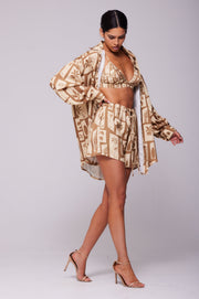 This is an image of Emma Top in Trestles - RESA featuring a model wearing the dress