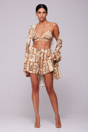 This is an image of Emma Top in Trestles - RESA featuring a model wearing the dress