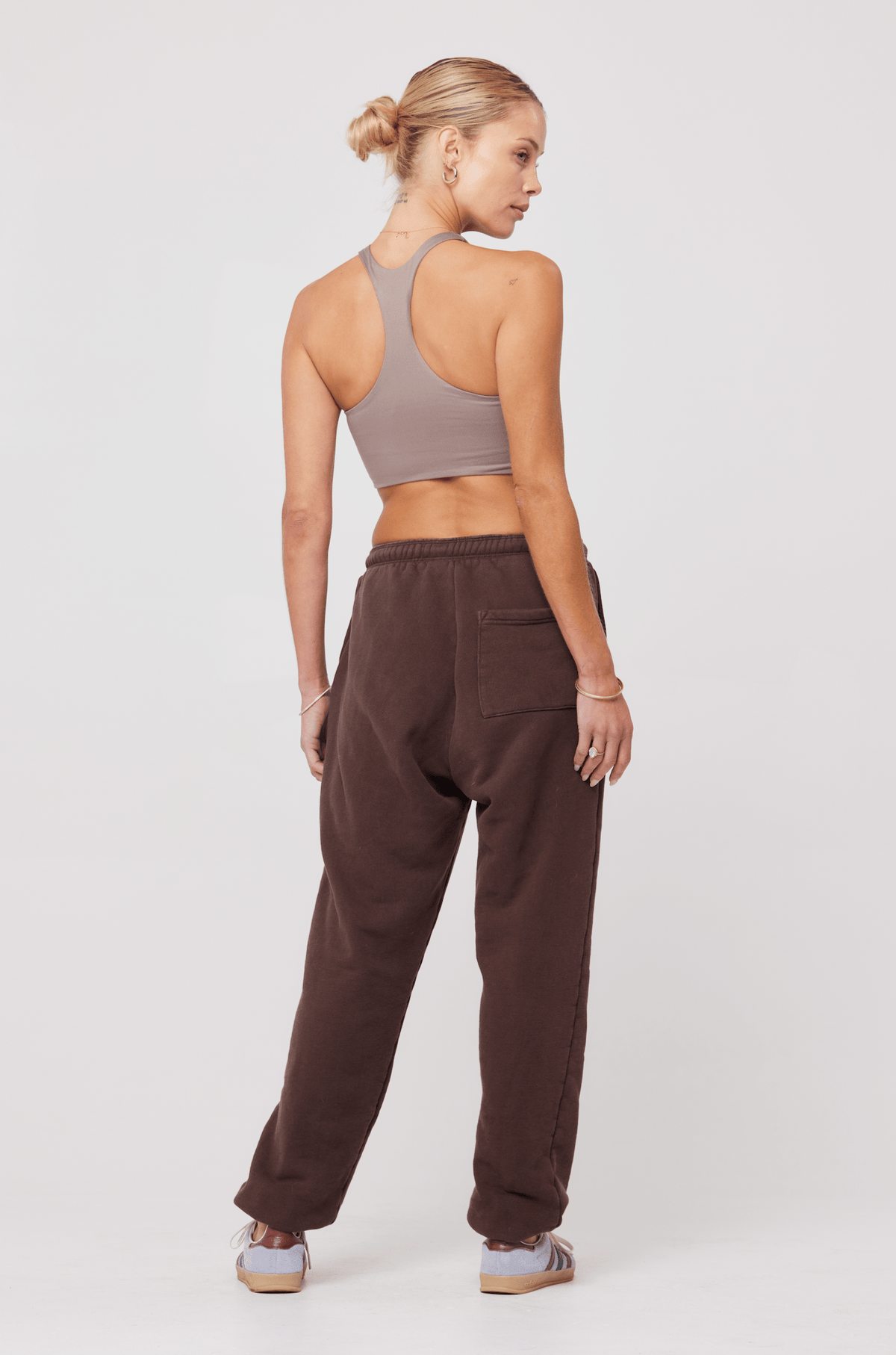 This is an image of Gia Tank in Taupe - RESA featuring a model wearing the dress