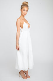 This is an image of Hannah Midi - RESA featuring a model wearing the dress