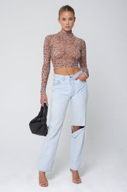 This is an image of Ida Top in Dallas - RESA featuring a model wearing the dress