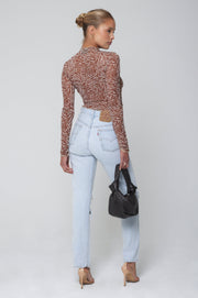 This is an image of Ida Top in Dallas - RESA featuring a model wearing the dress