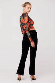 This is an image of Ida Top in Poppy - RESA featuring a model wearing the dress