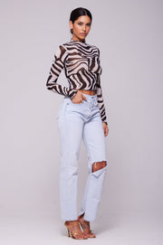 This is an image of Ida Top in Tigris - RESA featuring a model wearing the dress
