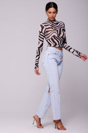 This is an image of Ida Top in Tigris - RESA featuring a model wearing the dress