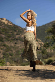 This is an image of Isla Skirt in Link - RESA featuring a model wearing the dress