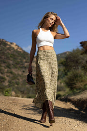 This is an image of Isla Skirt in Link - RESA featuring a model wearing the dress