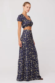 This is an image of Jamie Skirt in Midnight - RESA featuring a model wearing the dress