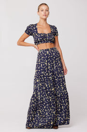 This is an image of Jamie Skirt in Midnight - RESA featuring a model wearing the dress