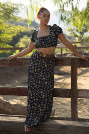 This is an image of Jamie Skirt in Midnight - RESA featuring a model wearing the dress