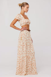 This is an image of Jamie Skirt in Wildflower - RESA featuring a model wearing the dress