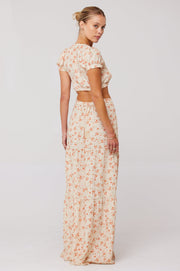 This is an image of Jamie Skirt in Wildflower - RESA featuring a model wearing the dress