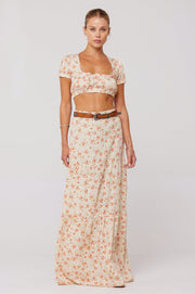 This is an image of Jamie Skirt in Wildflower - RESA featuring a model wearing the dress
