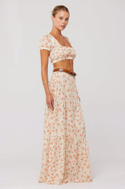 This is an image of Jamie Skirt in Wildflower - RESA featuring a model wearing the dress
