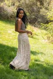 This is an image of Jamie Skirt in Wildflower - RESA featuring a model wearing the dress