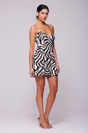 This is an image of Joelle Mini in Tigris - RESA featuring a model wearing the dress