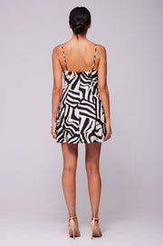 This is an image of Joelle Mini in Tigris - RESA featuring a model wearing the dress