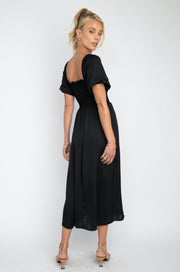This is an image of Kaia Midi - RESA featuring a model wearing the dress