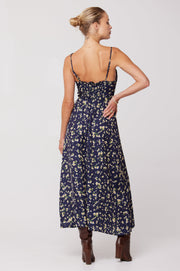 This is an image of Kaitlyn Midi in Midnight - RESA featuring a model wearing the dress